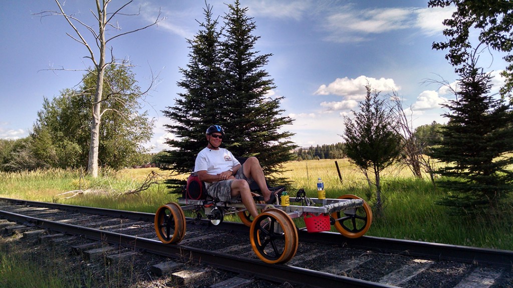 Kim Metlen demonstrates pedaling a Railrider.